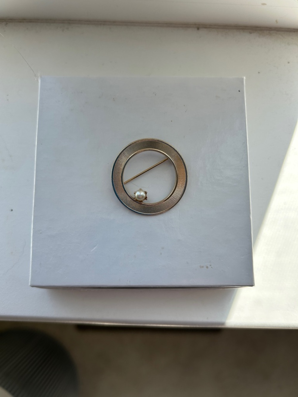 Gold Circular Pin Brooch with Pearl Accent
